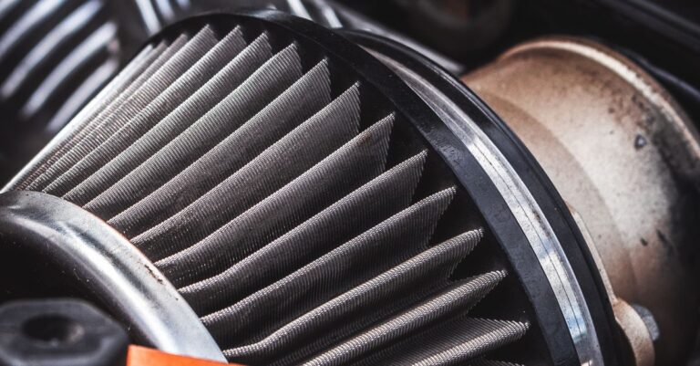 A close-up shot of an automotive air intake filter showcasing its design and structure.