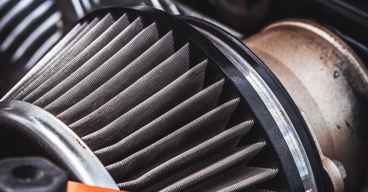A close-up shot of an automotive air intake filter showcasing its design and structure.